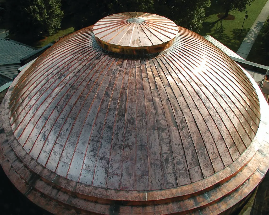 Craftsman Roofing crew installing a new roof in Holland Patent